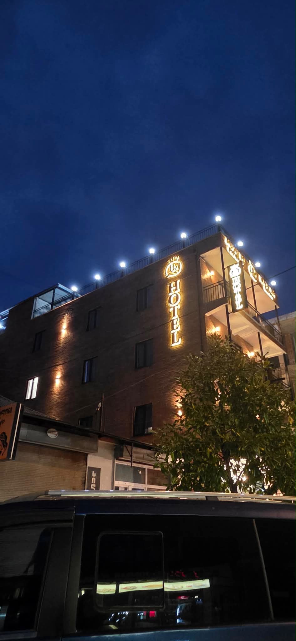 Side elevation of Black Sea Royal Hotel at night
